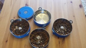 The bowls unlocked and loaded with kibble